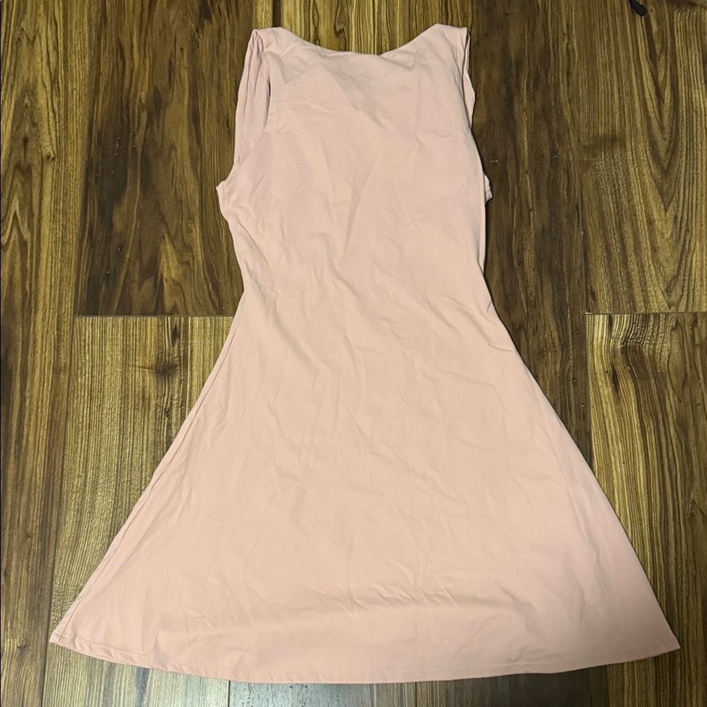 Qinsen opened back sleeveless dress built-in shorts with pockets